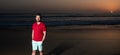 handsome man over the sea on sunset summer beach, copy space, summer Royalty Free Stock Photo