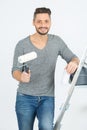 Handsome man painting wall in room Royalty Free Stock Photo