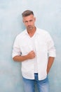 Handsome man perfect white shirt denim pants, barbershop hairdresser concept