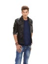 Handsome man, portrait and fashion with leather jacket, denim jeans or cool clothing on a white studio background Royalty Free Stock Photo