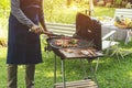 Handsome man preparing barbecue for friend Royalty Free Stock Photo