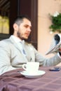 Handsome man reading newspaper Royalty Free Stock Photo