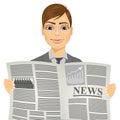 Handsome man reading a newspaper Royalty Free Stock Photo