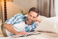 Handsome man relaxing on his bed Royalty Free Stock Photo