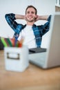 Handsome man relaxing on his desk chair Royalty Free Stock Photo