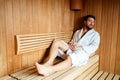 Handsome man relaxing in sauna Royalty Free Stock Photo