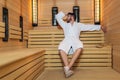 Man relaxing in sauna and staying healthy Royalty Free Stock Photo