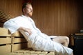 Handsome man relaxing in sauna and staying healthy Royalty Free Stock Photo