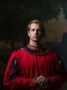 Handsome man in a Royal red doublet.