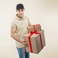 Handsome man in santa hat - hand gift box Royalty Free Stock Photo