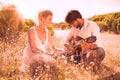 Handsome man serenading his girlfriend with guitar