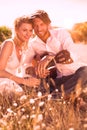 Handsome man serenading his girlfriend with guitar