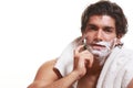 Handsome man shaving