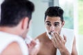 Handsome man shaving his beard Royalty Free Stock Photo