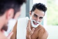 Handsome man shaving his beard Royalty Free Stock Photo