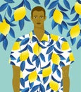 Handsome man in a shirt with lemons print on a lemon tree background. Royalty Free Stock Photo