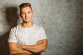 Man in shirt smiling and stand with crossed arms Royalty Free Stock Photo
