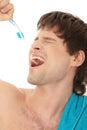 Handsome man singing to tooth brush Royalty Free Stock Photo