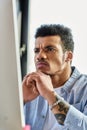 Handsome man deeply focused while working Royalty Free Stock Photo