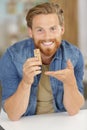 handsome man sitting at breakfast table with cereal Royalty Free Stock Photo