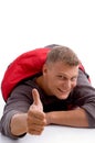Handsome man in sleeping bag and showing Royalty Free Stock Photo