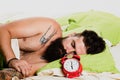 Handsome man sleeping in bed. Wake up Sleepy. Young man sleeping on soft pillows in bed at home. Royalty Free Stock Photo