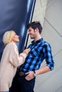 Handsome man smiling to a blonde woman Royalty Free Stock Photo