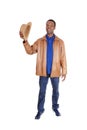 Handsome man standing in brown leather jacket Royalty Free Stock Photo