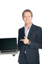 Handsome man in suit pointed with finger at laptop screen Royalty Free Stock Photo