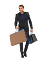 Handsome man in suit with shopping bags