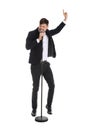 Handsome man in suit singing with microphone Royalty Free Stock Photo