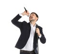 Handsome man in suit singing with microphone Royalty Free Stock Photo