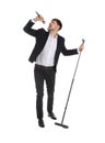 Handsome man in suit singing with microphone on white Royalty Free Stock Photo