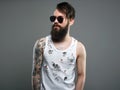 Handsome man in sunglasses. Brutal bearded hipster boy Royalty Free Stock Photo