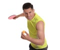 Handsome man with table tennis racket and ball on white background. Ping pong player Royalty Free Stock Photo