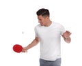 Handsome man with table tennis racket and ball on white background. Ping pong player Royalty Free Stock Photo