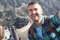 Handsome man taking a selfie in The Great Wall of China Royalty Free Stock Photo