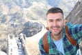 Handsome man taking a selfie in The Great Wall of China Royalty Free Stock Photo