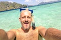 Handsome man taking a selfie during islands hopping at El Nido Royalty Free Stock Photo