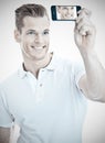 Handsome man taking a selfie Royalty Free Stock Photo