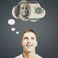Handsome man thinking about money Royalty Free Stock Photo