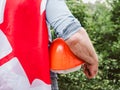 Handsome man with tools, holding a Canadian Flag Royalty Free Stock Photo