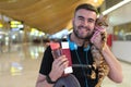 Handsome man traveling with his cat Royalty Free Stock Photo