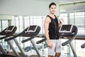 handsome man on treadmill drinking water Royalty Free Stock Photo