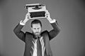 Handsome man with typewriter in fashion business suit