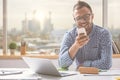 Handsome man using cellphone Royalty Free Stock Photo