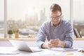 Handsome man using cellular phone Royalty Free Stock Photo