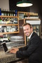 Handsome man using laptop computer Royalty Free Stock Photo