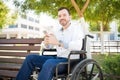 Handsome man using phone at the park Royalty Free Stock Photo