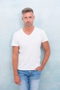 Handsome man wear tshirt. stylish guy has sexy bristle. gray-haired male with trendy look. male fashion and beauty. full Royalty Free Stock Photo